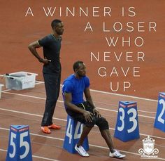 two men sitting on the side of a race track with an inspirational quote above them