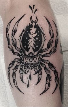 a black and white image of a crab on the leg, with an intricate design