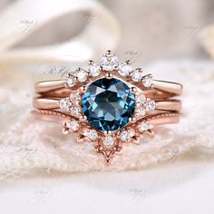 London Blue Topaz Wedding Ring, Birthday Ring, Anniversary Gift For Her, Elegant Ring Set Product Detail Main Ring Material: 10k/14k/18k Solid Rose/White/Yellow Gold Center Stone: 7mm Round Cut Natural London Blue Topaz Side Stones: Round Cut Moissanites Wedding Band 1 Material: 10k/14k/18k Solid Rose/White/Yellow Gold Gemstones: Round Cut Moissanites Wedding Band 2 Material: 10k/14k/18k Solid Rose/White/Yellow Gold Gemstones: Round Cut Moissanites Custom Service 1, Gemstones can be replaced wit Brilliant Cut Aquamarine Diamond Ring For Wedding, Wedding Diamond Ring With Aquamarine Halo Setting, Aquamarine Wedding Diamond Ring With Halo Setting, Wedding Aquamarine Diamond Ring With Brilliant Cut, Sapphire Birthstone Ring With Brilliant Cut For Wedding, White Gold Aquamarine Rings For Wedding, Sapphire Birthstone Ring With Diamond For Wedding, Sapphire Diamond Birthstone Ring For Wedding, Round Aquamarine Diamond Ring For Wedding