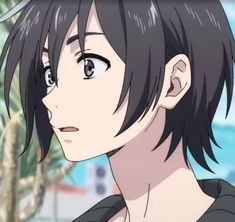 an anime character with black hair and blue eyes looking off to the side in front of a palm tree