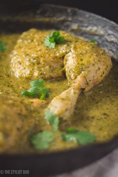 chicken with cilantro sauce in a skillet