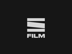 a black and white logo with the word film in it's center, on a dark background