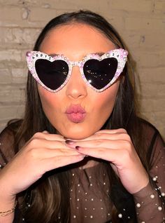 These sunglasses are unique, stylish and just the perfect gift! The heart-shaped design makes them so cute and trendy.  If you would like them customized just message me.  Possible options you might like: hello forty, fifty and fab, 21 and fun, newly 21, 30 and flirty, birthday queen, birthday babe, birthday gal, this is 40, 21 and thirsty, cheers to 21 years, etc. Check the images to see other possible sayings or you can always create your own.  Return Policy: As these sunglasses are customized products, we do not accept returns or exchanges unless there is a misspelling, we will send a corrected item at no additional charge. 23rd Birthday Themes, Bedazzled Sunglasses, Cheers To 21 Years, Hello Forty, Birthday Sunglasses, 23 Birthday, Personalized Sunglasses, Birthday Babe, Heart Glasses