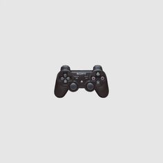 a black controller is shown against a white background with the word sony on it's side