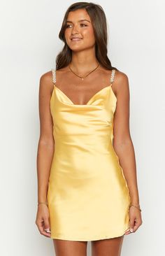 Yellow Satin Mini Dress

How to Style:
Feel good in our Tira Yellow Satin () Mini! The pearl strap detailing and bright yellow will have you stand out in the crowd! Compliment the outfit with gold jewellery () pieces and heels  ()for the ultimate look!

Features:


  
 * Bias Cut 
 * Mini Length 
 * Light Weight Satin Material 
 * Removable straps 
 * Pearl Straps 
 * Scoop Neckline 
 * Lined Light Yellow Dresses, Pearl Straps, Prom Midi Dress, Hoco Dress, 60's Dress, Summer Playsuit, Yellow Satin, Semi Formal Dresses, Beginning Boutique