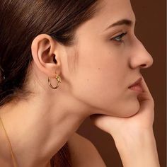 ✦ Meet our beloved influencer Kailey Souder and her adoration for all things minimal and gold. These knot earrings beautifully symbolize the connections we share, even in their simplicity. Just like the delicate knot, it represents the enduring simplicity and timeless elegance of love. ----------- DESCRIPTIONS ----------- *Sold in Pairs - SKU: F497 - Size: 2.3cm* 2.4cm - Materials: Titanium, 18K Gold Plating Gold Knot Earrings, Elegant Gothic, Nose Rings Hoop, Crystal Hoop Earrings, Hoops Earrings, Knot Earrings, Fashion Jewelry Earrings, Simple Earrings, Bridesmaid Jewelry