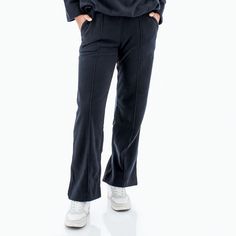 These are not your ordinary sweats. No, the Weekender Pant is a standout because of its sustainable origins and fine details. The fabric is 100% recycled polyester, a fiber hailed for its ability to repurpose plastic waste. Created from rPET, or hard plastic items like water bottles, recycled polyester is spun into the cozy Weekender Pant before you. Microfleece will make you feel wrapped up in a blanket, so soft and lovely against the skin. Of course, we love the small details of this pant, inc Sporty Relaxed Fit Bottoms In Recycled Polyester, Sporty Recycled Polyester Bottoms With Relaxed Fit, Relaxed Fit Recycled Polyester Pants With Pockets, Casual Recycled Polyester Pants, Fall Athleisure Pants With Straight Hem, Relaxed Fit Bottoms In Recycled Polyester, Relaxed Fit Solid Bottoms In Recycled Polyester, Relaxed Fit Athleisure Bottoms In Recycled Polyester, Athleisure Bottoms In Recycled Polyester With Relaxed Fit