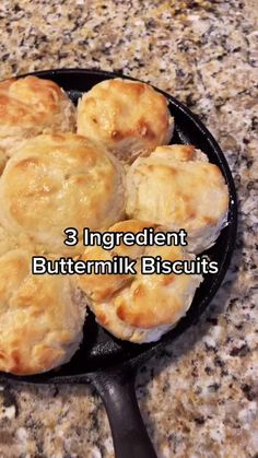 three ingredient buttermik biscuits in a cast iron skillet on a granite countertop