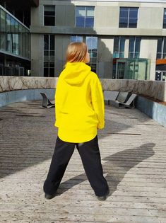 "Unisex bright yellow sweatshirt hoodie. Long oversize big hood cotton hoodie for man or woman. Extra long sleeves. Perfect hoodie for travelling. Large hood keeps your head warm. Two pockets in front. HQ-Heavy duty material. Density - 280g/m2. Made in EU. FABRIC: 82 % cotton 8% polyester. Size S Length front (in/cm) 31.5/80 Length back (in/cm) 33/85 Width (in/cm) 24.4/62 Sleeve length (in/cm) 26.4/67 Size M Length front (in/cm) 33/84 Length back (in/cm) 35/89 Width (in/cm) 25.6/65 Sleeve length Oversized Yellow Hooded Hoodie, Yellow Hooded Casual Sweater, Oversized Yellow Cotton Hoodie, Casual Yellow Hooded Sweater, Oversized Yellow Casual Sweatshirt, Oversized Yellow Sweater For Streetwear, Yellow Hoodie For Fall, Yellow Oversized Hooded Outerwear, Yellow Winter Sweater For Streetwear