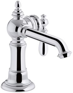 a chrome faucet with black handles