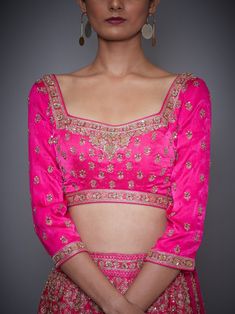 Editor's Note This set features a neon pink embroidered lehenga with blouse and dupatta. Sleeve Type: 3/4 Sleeves Neck: Square Neck Fabric: Silk Satin 80 Gms Care: Dry Clean Only About the DesignerRi Ritu Kumar is one of India’s foremost designers. She has developed a unique style of her own, reflecting the ancient traditions of Indian craftsmanship in a contemporary vocabulary. With a background in art history and museology, which has enriched her horizons, Ritu’s understanding of ancient desig Pink Sharara With Unstitched Blouse For Eid, Pink Sets With Unstitched Blouse For Eid, Pink Blouse With Dupatta For Reception, Festive Pink Blouse Piece For Reception, Pink Anarkali Set With Unstitched Blouse For Party, Pink Blouse Piece With Zari Work For Reception, Pink Dress With Unstitched Blouse For Festivals, Designer Pink Blouse For Eid, Eid Pink Dresses With Unstitched Blouse