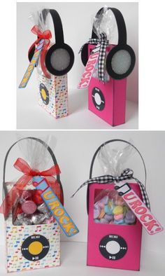 two boxes with headphones and candy in them, one has a bow on the top