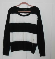 WOMEN'S A.N.A. BLACK AND WHITE STRIPE WIDE CREW NECK SWEATER - SIZE PETITE XLARGE - DROPPED SHOULDER LONG SLEEVE - RIBBED NECK, WRISTS AND WAIST - RELAXED FIT - HITS BELOW WAIST  MEASUREMENT FROM ARMPIT TO ARMPIT IS APPROXIMATELY 22 1/2" AND FROM TOP OF SHOULDER TO BOTTOM HEM FRONT IS APPROXIMATELY 25" PLEASE FEEL FREE TO EMAIL ME WITH ANY QUESTIONS THANKS FOR LOOKING SMOKE FREE HOME Black Casual Sweater With Contrast Stripes, Casual Black Sweater With Contrast Stripes, Trendy Crew Neck Sweater With Contrast Stripes, White Crew Neck Sweater With Contrast Stripes, White Knit Sweater With Contrast Stripes, Knit Crew Neck Sweater With Contrast Stripes, Knit Sweater With Contrast Stripes Crew Neck, Winter Knit Tops With Contrast Stripes, Winter Knit Top With Contrast Stripes