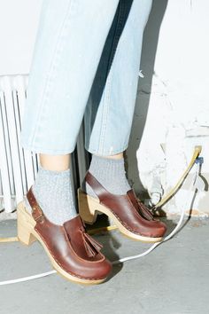 No. 6 is pretty much our favorite clog brand ever. We're especially feeling their Crowley Tassel clog, a smart menswear inspired loafer clog with a feminine heel. Get your sparkle socks ready. Clogs With Tights, Smart Menswear, Knee High Socks Outfit, Sparkle Socks, Vans Outfit, Shoes And Boots, Brogue Shoes, Shop Shoes