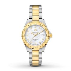 Elegantly appointed with a white mother-of-pearl dial and diamond hour markers set in a 32mm stainless steel case encircled by an 18K yellow gold-plated bezel, this AQUARACER Lady Quartz watch from TAG Heuer makes time feel luxurious. Topped by a scratch-resistant sapphire crystal, the dial includes a date window and yellow-gold-tone hands and hand-applied indexes. A fold-over deployment clasp secures the two-tone 18K yellow gold-plated and stainless steel bracelet. The women's watch features a Swiss quartz movement and is water-resistant to 300 meters. Tag Heuer Women, Tag Heuer Aquaracer, Swiss Army Watches, Tag Heuer Watch, Invicta Watches, Seiko Watches, Yellow Gold Bracelet, Two Tone Watch, Rolex Daytona