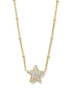 With the Jae Gold Star Pave Short Pendant Necklace in White Crystal, your layered look has never looked more stellar. Set on a satellite chain, this star-shaped pendant sparkles thanks to its dazzling white crystal detailing. It’s perfect for everyday wear and has just enough personality to make you stand out. Metal 14k Yellow Gold Over Brass Material White Crystal Closure Spring Ring Clasp Size 19" Chain ,0.46"L X 0.53"W PendantDue to the one-of-a-kind nature of the medium, exact colors and patterns may vary slightly from the image shown. | Kendra Scott Jae Gold Star Pave Short Pendant Necklace in White | Crystal Star Kendra Scott Necklace, Kendra Scott Necklace Aesthetic, Jewelry Inspo Gold, Kendra Scot, Star Necklaces, Gold Star Necklace, Short Pendant Necklace, Wishlist Ideas, Coastal Jewelry