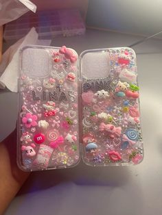 two cases with hello kitty and other items on them