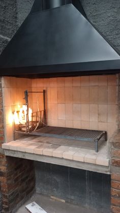 a brick oven with two lights on it