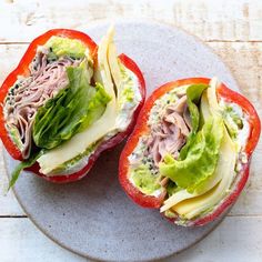 an open tomato with meat and lettuce on it