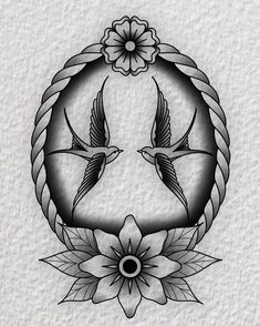 a tattoo design with two birds and flowers in the center, on a white paper background