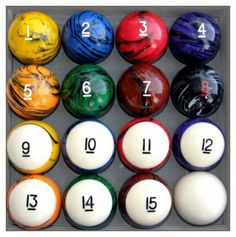 eight ball set with numbers in the middle and six balls on each side, all different colors