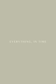 the words everything in time are written on a gray background with white lettering that says everything in