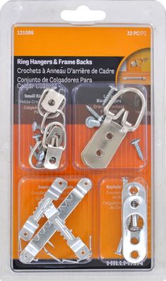 three pieces of metal furniture hardware with screws and hooks on each side, in packaging