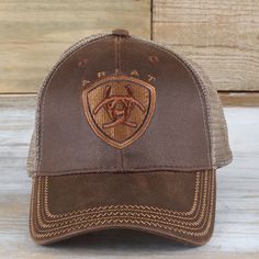 Ariat Brown Oilskin Cap Western Men Gifts, Western Style Brown Trucker Hat For Outdoor, Brown Mesh Baseball Cap, Brown Trucker Hat For Rodeo, Brown Mesh Trucker Hat, Brown Baseball Cap With Embroidered Logo, Casual Brown Mesh Hat, Brown Rodeo Hat With Leather Patch, Brown Trucker Hat With Embroidered Logo For Outdoor