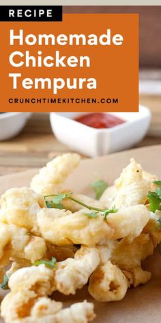 homemade chicken tempura on a cutting board with ketchup in the background