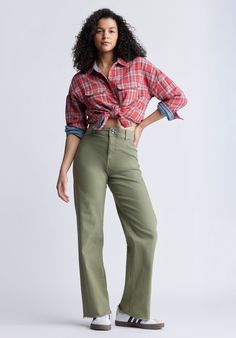 A wide-leg pair of pants with frayed hem, the Adele is a high rise that feature a flat front, back pockets and zip fly. The soft wash gives them a nice lived-in look. Casual Wide-leg Flare Jeans With Frayed Hem, Green Wide Leg Pants For Fall, Olive Wide Leg Pants For Fall, Casual Olive Wide-leg Pants, Green Wide Leg Utility Jeans, Green Wide Leg Jeans For Fall, Trendy Olive Pants For Fall, Green Wide Leg Cargo Pants With Five Pockets, Green Wide Leg Pants With Five Pockets