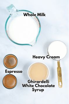 ingredients to make chocolate syrup on a white counter top, including milk, sugar and cream