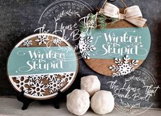 "Embrace the whimsy of winter with our round sign boldly declaring, \"Winter Is Stupid!\" Choose your display preference: hang it proudly or prop it on an easel (not included) for a touch of seasonal sass! Perfect for those who want to add a dash of humor to their winter décor.  Measures approx 9\" round. Choose from top/bottom snowflake design or bow/greenery design" Winter Door Signs With Trees, Winter Wonderland Door Hangers, Please Don't Snow Door Hangers, Winter Ornament Door Hanger, Winter Door Hangers Deer Hunter, Simple Winter Door Hangers, Cricut Door Signs Winter, Winter Door Signs Entrance, Cricut Winter Door Sign