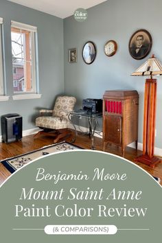 a living room with blue walls and wooden floors is featured in this ad for bergman moore's mount saint ame paint color review