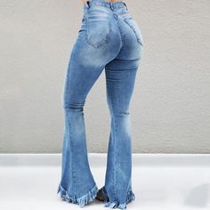 This sassy flare fringe denim pants is a MUST for your wardrobe. Featuring a fashionably-ripped design in three fabulous denim washes from which to choose. Made with a denim and polyester blend or comfort and style. Pair with a cropped sweater for a fabulous Fall look. Extra High Waisted Jeans, Denim Chic, Jean Trends, Jeans Material, High Waisted Jeans, Long Sleeve Knit Tops, Denim Flares, Denim Trousers, Feminine Look