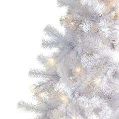 This holiday transform your home into the ultimate winter wonderland with the help of this White Artificial Christmas tree! Completely maintenance-free, this snow-white fake Christmas tree boasts an array of soft looking pine foliage with 680 bendable branches for accenting with your own personalized ornaments and holiday accents - all beautifully designed in a palette of winter white.  Arriving pre-strung with 250 LED lights to eliminate tangles and carefully stabilized on a metal stand, this handsome 6’ tall artificial Christmas tree will not only make holiday decorating a breeze but ensure your home is always looking picture-perfect throughout the holiday season. White Artificial Christmas Tree, Christmas Tree Clear Lights, Fake Christmas Trees, Faux Christmas Trees, Slim Christmas Tree, Prelit Tree, Warm White Led Lights, A White Christmas, Artificial Foliage