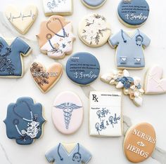 decorated cookies are arranged on a table with the names of doctors and nurse's