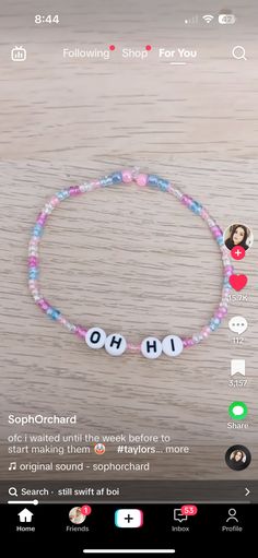 a bracelet with the word ohh on it and an image of a woman's face