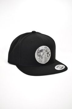 Silver Full Moon Snapback Hat -  Moonphase Camp Hat This black snapback hat features a large laser engraved faux leather patch with my hand drawn dot-work Moon design. The design is engraved into black faux leather revealing a shimmery metallic silver finish. This patch is attached to the snapback with a strong waterproof fabric glue. Snapback style with a classic green under-bill. Black Adjustable Snapback Hat With Flat Crown, Adjustable Black Snapback Hat With Flat Crown, Adjustable Snapback Hat With Curved Brim For Festivals, Festival Snapback Hat With Flat Bill, Adjustable Flat Bill Snapback Hat For Festival, Adjustable Snapback Baseball Cap For Festivals, Adjustable Baseball Cap For Festivals, Moon Crop Top, Sacred Geometry Clothing