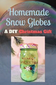 a green glass jar with snow globes on it and the words homemade snow globes