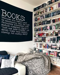 a living room filled with lots of books