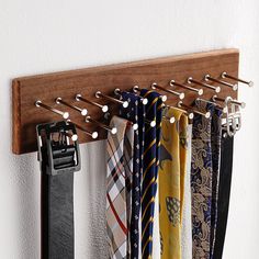 a tie rack with ties hanging from it