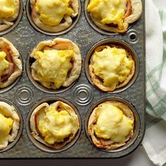 muffins with eggs and ham in a muffin tin