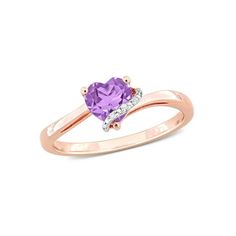 A captivating blend of elegance and charm, this ring features a heart-cut purple amethyst gemstone, the birthstone for February, adorned with a delicate diamond accent that shimmers with grace. Meticulously crafted, this pink sterling silver ring embodies dainty sophistication, making it a heartfelt gift for her. The enchanting amethyst, reminiscent of royal allure, harmonizes beautifully with the subtle sparkle of diamonds, creating a timeless fusion of modernity and grace.Designed for versatil Dainty Diamond Band, Crossover Diamond Ring, Heart Promise Rings, White Diamond Ring, Citrine Gemstone, Diamond Rings Bands, 2 Carat, Amethyst Gemstone, Amethyst Ring