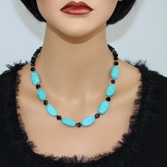 ♥ Ready to ship ♥ 100% handmade ♥ Packed in a gift box ♥ Material - Natural Turquoise, black onyx beads ♥ Custom length ♥ Custom orders are welcome Aqua Blue Turquoise and Black Beads Statement Necklace - the perfect accessory to elevate your style!  Handcrafted with care, this necklace features an exquisite combination of aqua-blue turquoise and black beads, creating a captivating color palette.  The bold design and striking contrast make this piece a true statement maker, sure to turn heads wh Turquoise Jewelry With Black Beads For Gift, Elegant Turquoise Necklace With Polished Beads For Gift, Elegant Turquoise Necklace With Polished Beads As Gift, Turquoise Beaded Necklaces With Black Beads As Gift, Handmade Adjustable Black Turquoise Necklace, Gift Turquoise Beaded Necklaces With Black Beads, Turquoise Necklace With Black Beads As Gift, Elegant Turquoise Necklace With Faceted Beads As Gift, Elegant Turquoise Jewelry With Black Beads