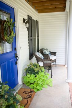 the front porch is clean and ready for us to use as an inviting place for guests