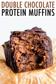 double chocolate protein muffins stacked on top of each other with text overlay