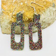 Laser cut rainbow glitter geometric acrylic earrings. These sparkly statement earrings were cut from 3mm rainbow glitter acrylic. They're simple in design but make pretty loud statement when you're out and about. Earrings measured 2.5 inches long and 0.8 inches wide, not counting the hooks. These can be made into clip on earrings. Earrings will be placed in a gift box, carefully packed and shipped, perfect as a gift for yourself or a loved one. Any questions? Please feel free to contact me! Plea Multicolor Rectangular Earrings For Party, Earrings Rectangle, Rectangle Earrings, Glitter Acrylic, Glitter Acrylics, Etsy Bridesmaid Gifts, Rainbow Glitter, Earrings Statement, Earrings Boho