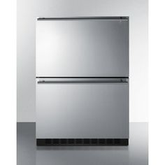 a stainless steel refrigerator freezer sitting on top of a counter