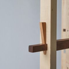 a close up of a wooden handle on a door