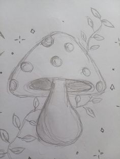 a drawing of a mushroom with leaves on it